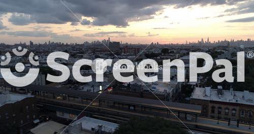 Ridgewood, Queens, NY, USA, July 2018: Aerial View Of Illuminated Train Station In Ridgewood At Sunset 